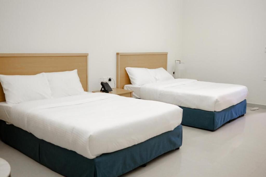 Deluxe Queen Room with Two Queen Beds at Assia Hotel, Sharjah